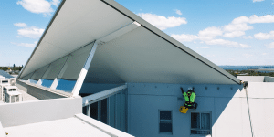 An Anchor Safe Rope Access technician uses abseil rated access points to reach areas of the facade that would otherwise be unreachable